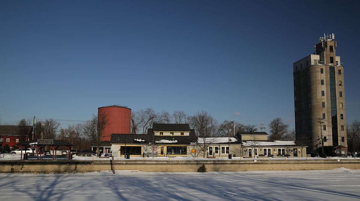 Image of Pittsford Village commercial buildings in the snow in January 2019
